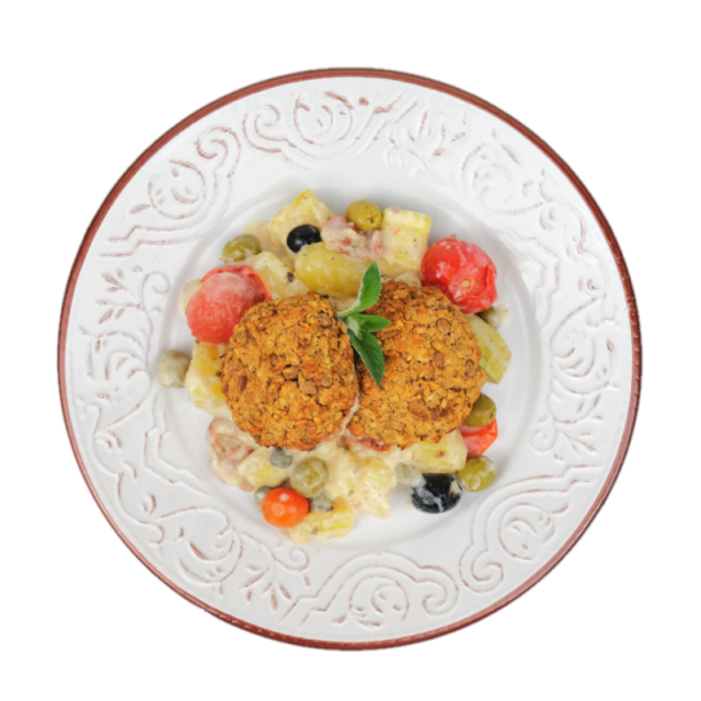 Chiftelute de linte si bulgur cu sote de cartofi cu dovlecel, rosii cherry, rosii uscate, masline si capere la cuptor 250g